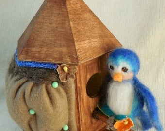 The blue bird of happiness felted wool pincushion will remind you of blessings that are all around the every day places. l