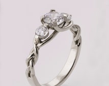 Three stone celtic engagement rings
