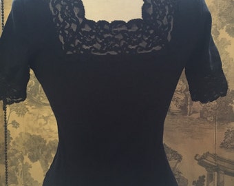 Black 1990s T-shirt with lace sleeves and neck line