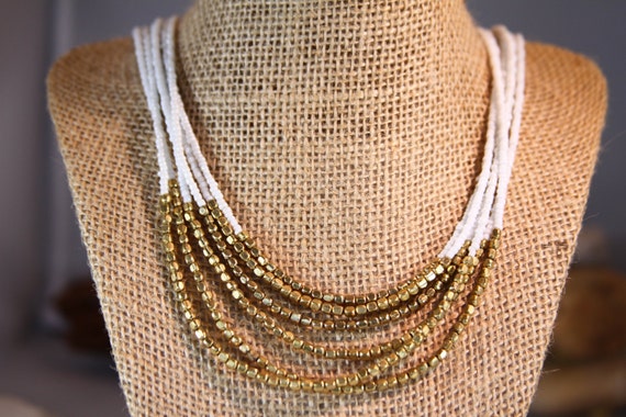 Multi strand white & Gold necklace