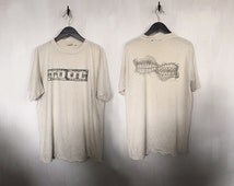 Popular items for 90s vintage tshirts on Etsy