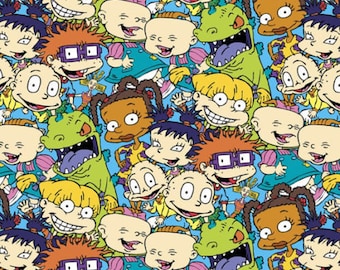 Cartoon Fabric - Nickelodeon Rugrats Packed Characters by Springs Creative 100% cotton fabric 44" wide ***SC19***
