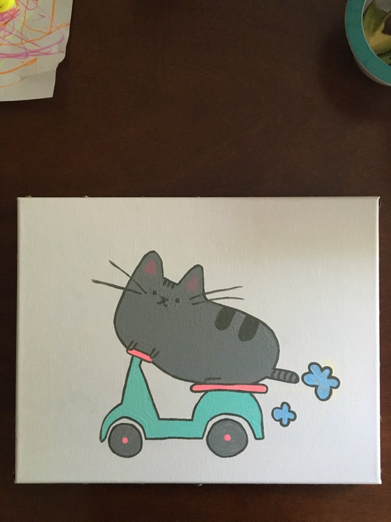 pusheen cat on scooter