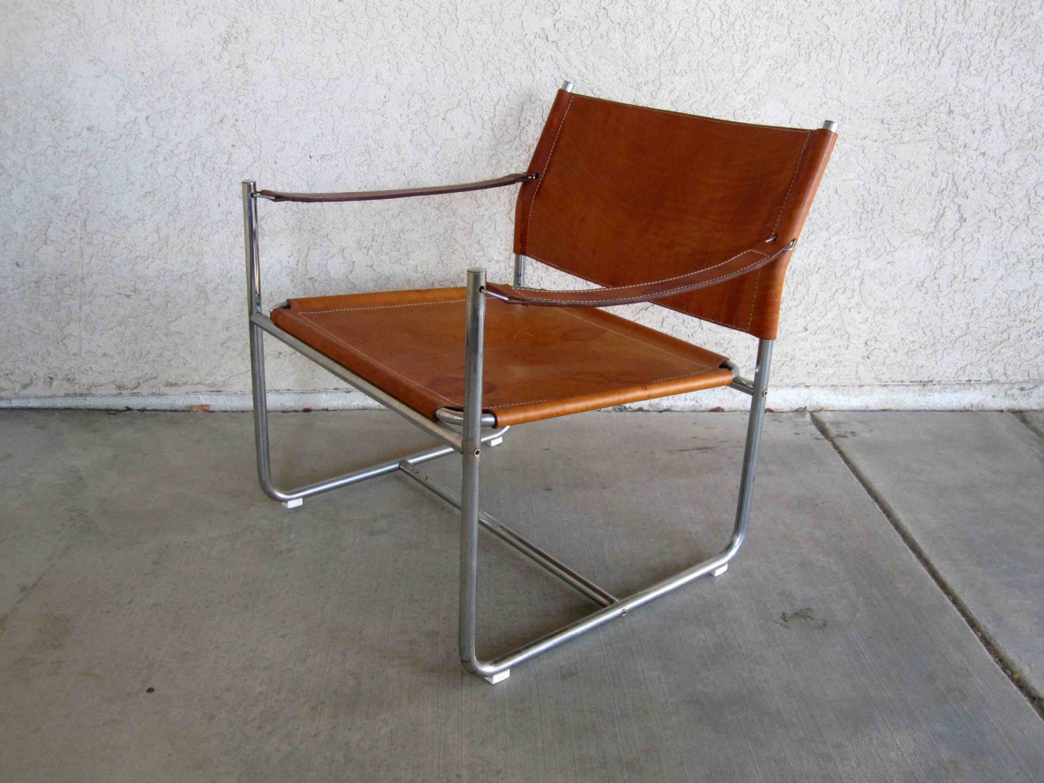 Vintage Mid Century Sling Chair in Leather and Chrome. by MidMod