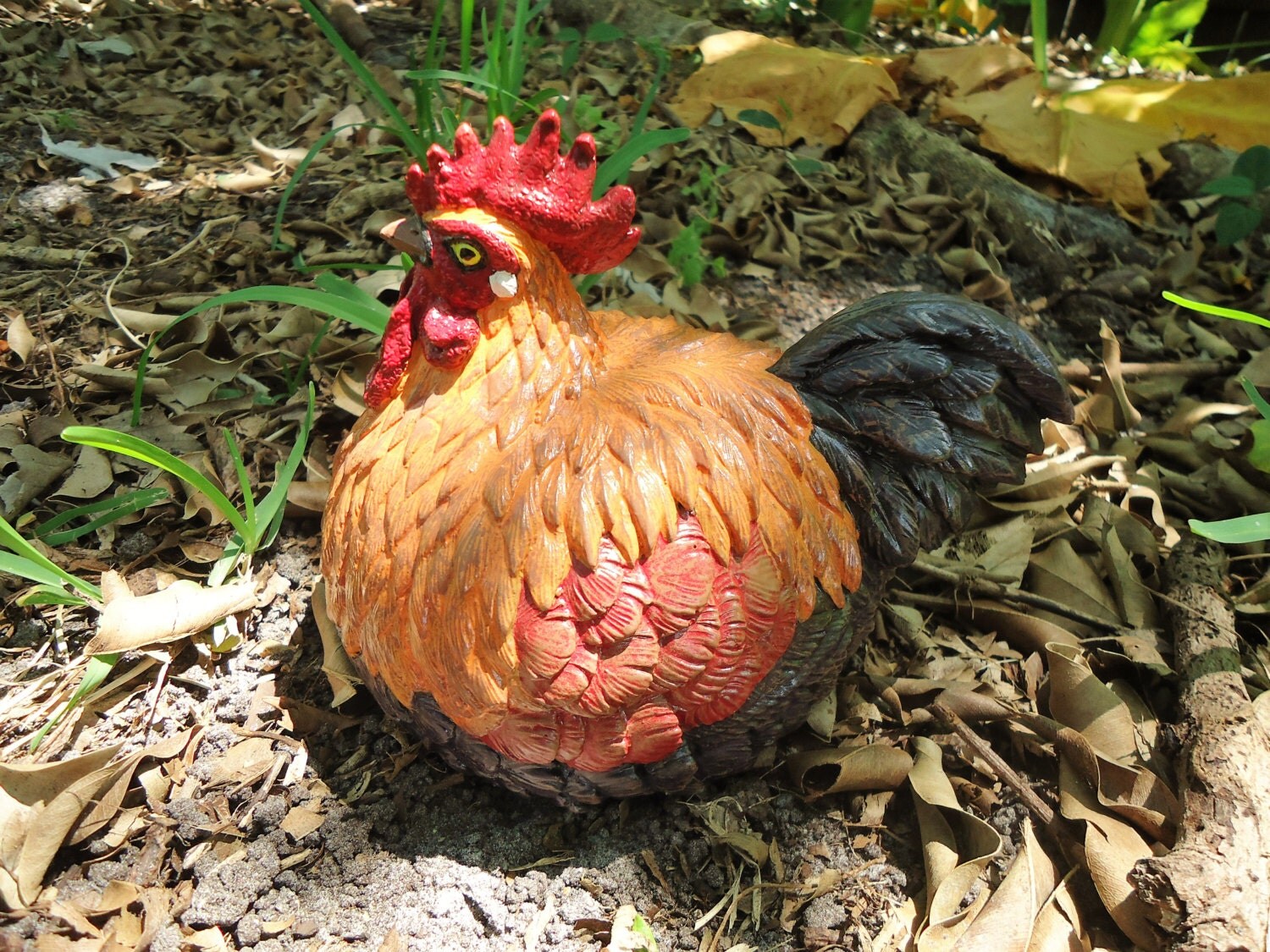 cement rooster statue
