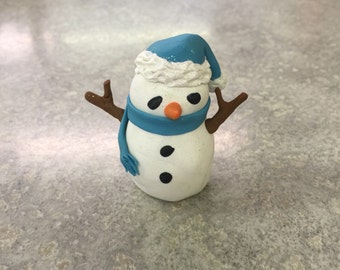 Snowman with a blue scarf polymer clay