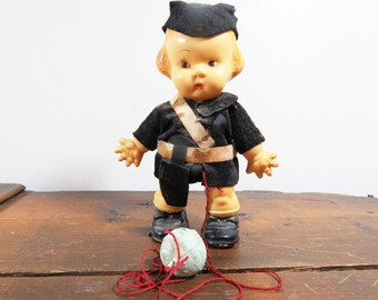 Vintage Celluloid Walk A Way Baby Doll toy- Crossing guard walking toy- doll pull toy walker toy