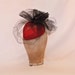 Handmade heart shaped fascinator decorated with black net and tulle
