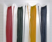 Primary colours of Tiger Thread, 20 yards each of red, green, yellow and blue, AKA Ritza 25