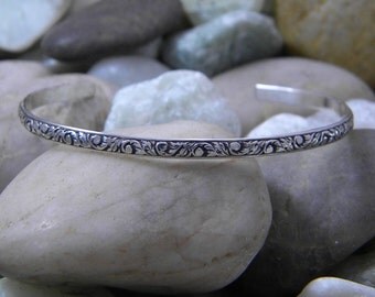 Sterling Silver Cuff Bracelet with antiqued floral pattern