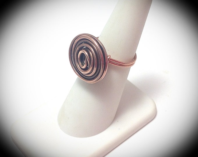 Antiqued copper wire wrapped ring with large swirl focal