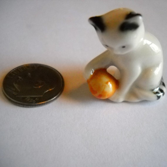 miniature cat figurine