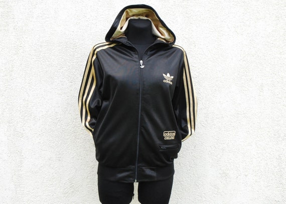 black adidas jacket with yellow stripes