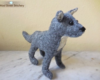 small stuffed wolf