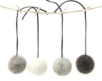 Felted wool ball with tail for cats