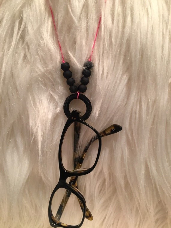 Items similar to Small Black Ring eyeglass holder on Etsy