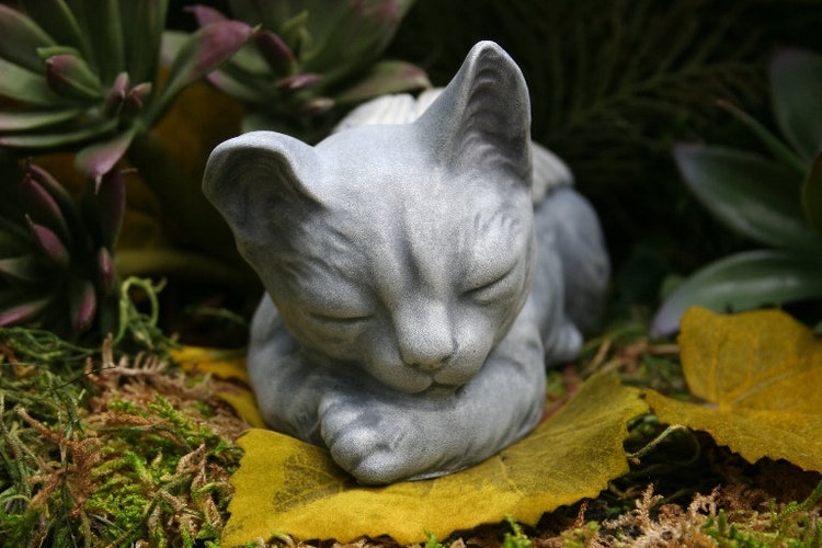 sleeping cat outdoor statue