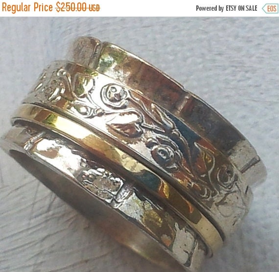 Spinner ring with flowers