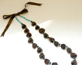 Handmade one-of-a-kind boho wooden brown and aqua beaded necklace with bow Handmade one-of-a-kind boho wooden brown and aqua beaded necklace with bow