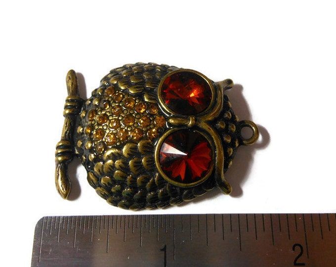 Large owl pendant, rhinestone & antiqued brass, orange rhinestone eyes, golden yellow rhinestone chest, brass feathers and branch, 38x33mm