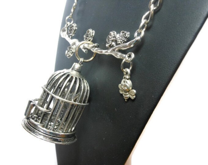 Large birdcage pendant, antiqued silver-finished, 42x36mm birdcage focal, on a branch with flowers with a dangling bumble bee necklace