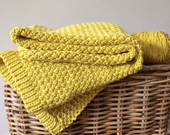 Mustard yellow blanket hand knit w soft cotton and bamboo yarn. Woven yellow coverlet for sofa or bed. Textured basket weave pattern throw.