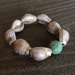 Turks and Caicos bracelet - Modern, elegant & preppy. Vintage resin shell beads grounded with a turquoise, gold plated crystal pave bead