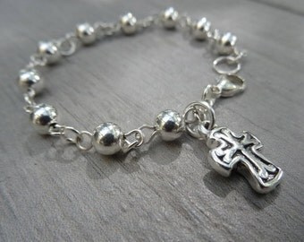 Sterling silver rosary bracelet. 10 bead rosary with puff cross