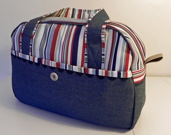A spacious holdall weekender with zip fastening and front pocket