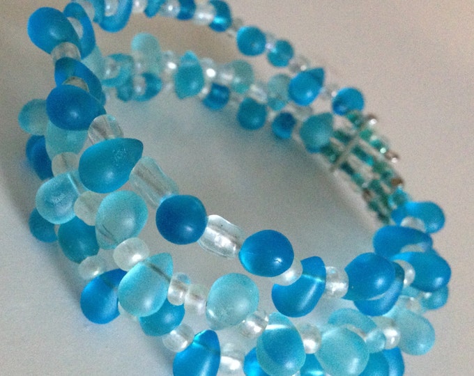 medium and light blue glass beaded cuff bracelet