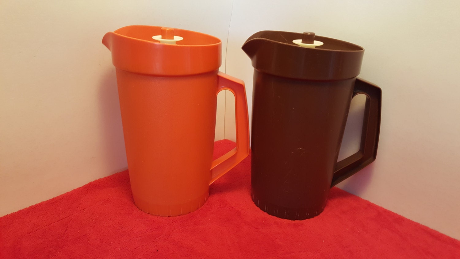 Tupperware 2 quart orange or brown pitcher with plunger lid