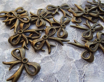 19 vintage antique gold bow embellishments / metal finding / altered art / Jewelry Supplies / Mixed Media Supplies / Assemblage supply / DIY