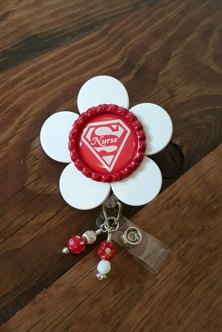 Super Nurse white flip off vial cap retractable badge reel ID
