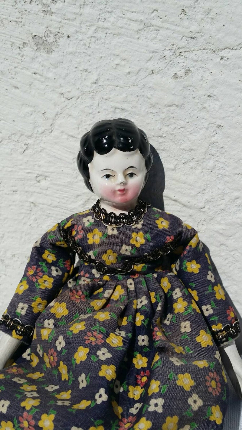 porcelain doll with cloth body