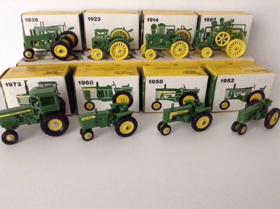 Complete Set Of 8 Vintage John Deere Toy Tractors by Ertl