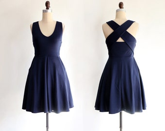 SOLSTICE | Navy - navy blue cross back straps dress. retro halter style bridesmaid dress. back cut out fit and flare dress with pockets
