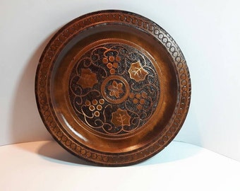 Wooden wall plate, wood turning, grape, flower & leaf design, copper highlights, 8 5/8 inch