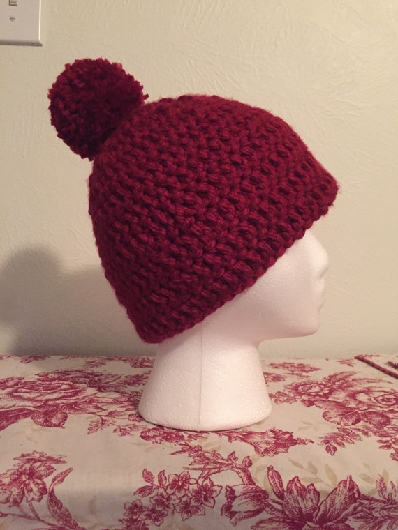 Items similar to Red poof ball crochet hat on Etsy