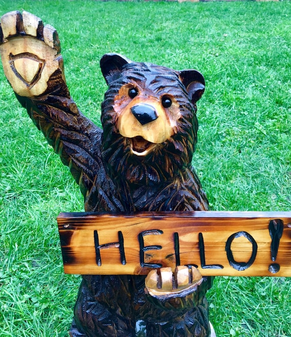 Items similar to WAVING WELCOME BEAR chainsaw carved garden handmade