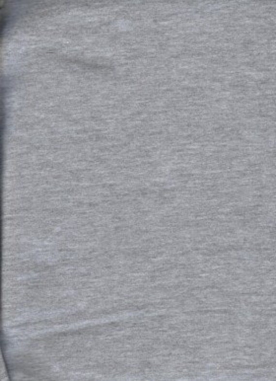 Knit fabric: Solid Heather gray. Cotton lycra fabric. Sold by