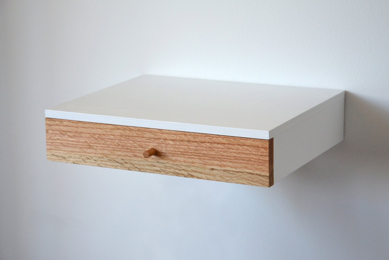 Pair of custommade floating shelves with oak by MyFeatheryFriends
