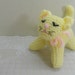 stuffed yellow cat