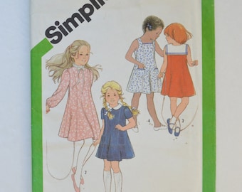 1980s Vintage Simplicity Sewing Pattern 9936 Girls Princess Seam Dress, Sleeveless, Short or Long Sleeves, High Neckline, Collars Size 4