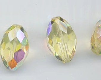 Three vintage Swarovski crystal beads of uncommon beauty and rarity: Art. 46 - 12 x 18 mm - jonquil aurore boreale
