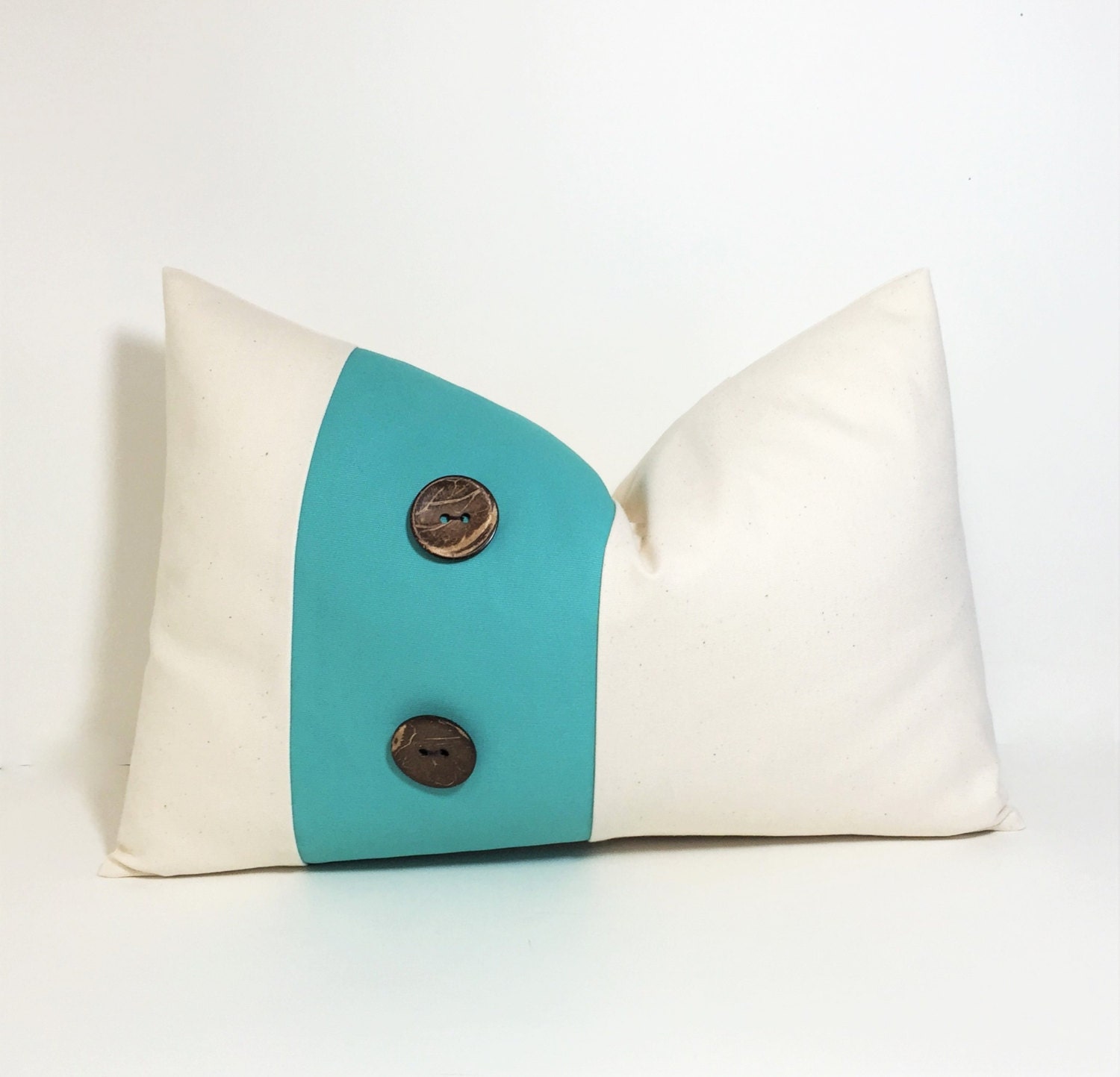 Button pillow cover. Aqua on natural colorblock lumbar.