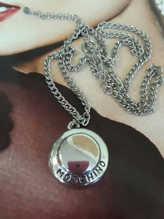 Moschino necklace with round pendant