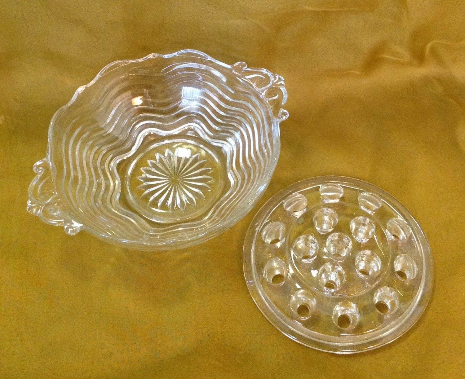 Clear depression glass flower bowl vase with 16 hole frog
