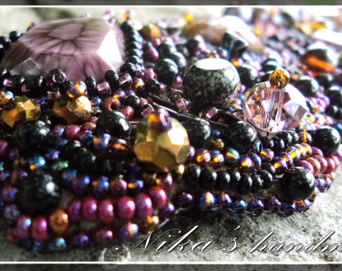 Purple-black beaded bracelet with rhinestones, Czech crystals, sequins and big artificial plastic stones in the Gothic and Fantasy style