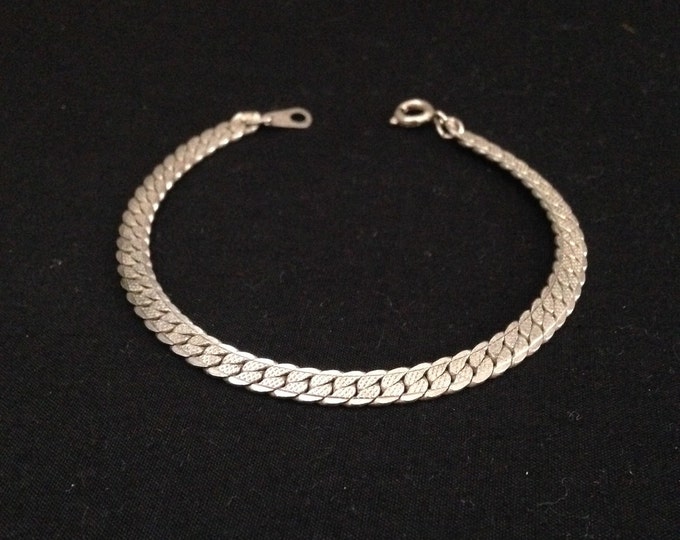 Storewide 25% Off SALE Vintage Silver Tone Elegantly Interlocked Designer Bracelet Featuring Raised Design Style Accent