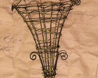 Fil de fer French scone Arcs and points finely hand crafted from wire Found at Chelsea Flea